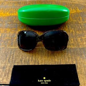 Kate spade tortoise sunglasses with slight sparkle to them.